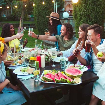 Friends gathered at a backyard celebration