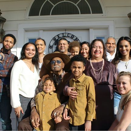 Family members laughing together at a reunion