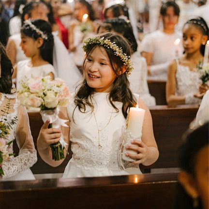 A child dressed for a first communion