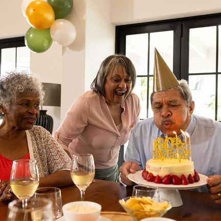 An older man celebrating a milestone birthday